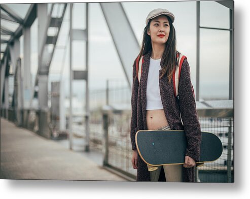Cool Attitude Metal Print featuring the photograph Woman skater outdoors by South_agency