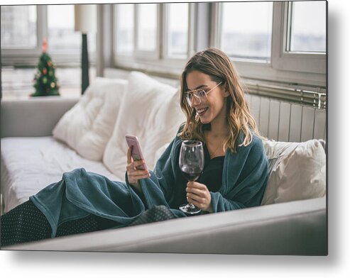 Apartment Metal Print featuring the photograph Woman using cell phone by Freemixer