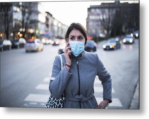 Air Pollution Metal Print featuring the photograph Woman With Wear Talking On The Phone. by ArtistGNDphotography