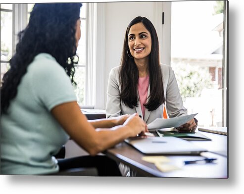 Working Metal Print featuring the photograph Women meeting in business office by MoMo Productions