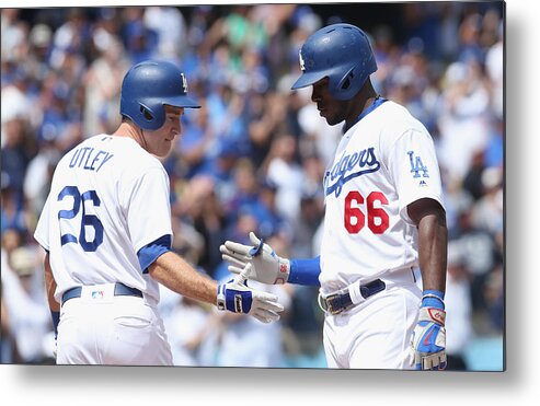 Scoring Metal Print featuring the photograph Yasiel Puig and Chase Utley by Stephen Dunn
