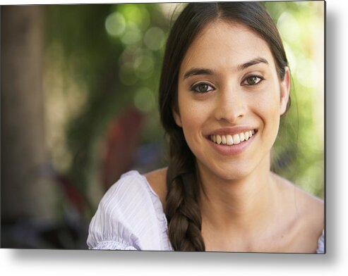 Part Of A Series Metal Print featuring the photograph Young woman smiling, portrait, close-up by Maria Teijeiro