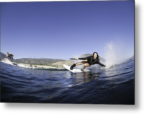 People Metal Print featuring the photograph Young Woman Wakeboarding by Darryl Leniuk