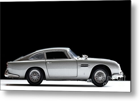 Figurine Metal Print featuring the photograph Aston Martin Db5 Model #1 by Simonbradfield