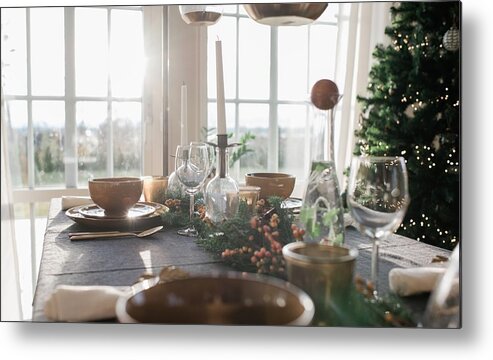 Decoration Metal Print featuring the photograph Tall Candles On A Decorated Dinner Table At Home At Christmas by Cavan Images