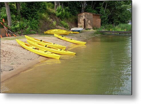 A Lake Metal Print featuring the photograph Yellow Boats in a sports Club by Dubi Roman