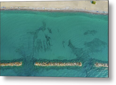 Beachfront Metal Print featuring the photograph Aerial view from flying drone of people relaxing on the beach. Paphos Cyprus by Michalakis Ppalis