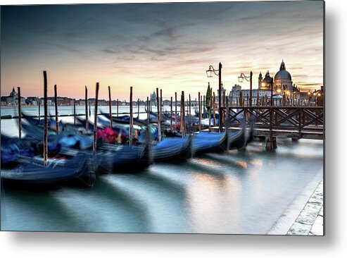 Gondola Metal Print featuring the photograph Venice Gondolas moored at the San Marco square. by Michalakis Ppalis
