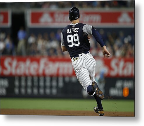 People Metal Print featuring the photograph Seattle Mariners v New York Yankees by Rich Schultz