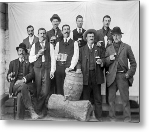 1035-895 Metal Print featuring the photograph Men Around A Keg Of Beer by Underwood Archives