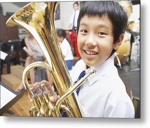 Education Metal Print featuring the photograph Students in music class by OJO Images