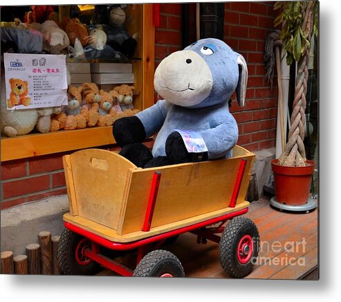 Donkey Metal Print featuring the photograph Stuffed donkey toy in wooden barrow cart by Imran Ahmed