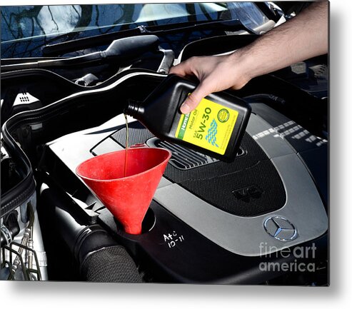Auto Metal Print featuring the photograph Oil Change by Photo Researchers