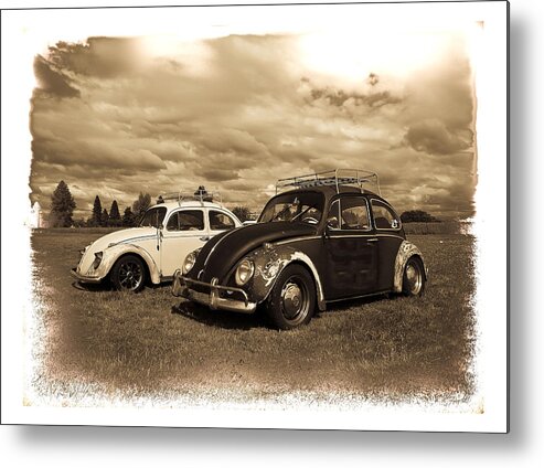 Vw Bug Metal Print featuring the photograph Old VW Beetles by Steve McKinzie