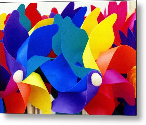 Toy Metal Print featuring the photograph What Goes Around by Wayne Potrafka