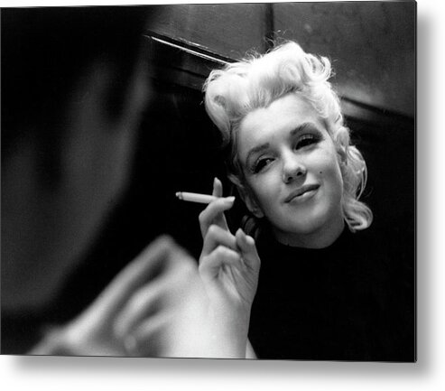 1950-1959 Metal Print featuring the photograph Marilyn Candid Moment by Michael Ochs Archives