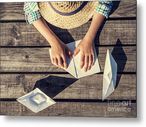 Sailboat Metal Print featuring the photograph Boy Hands Making A Paper Boats by Soloviova Liudmyla