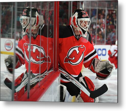 National Hockey League Metal Print featuring the photograph Carolina Hurricanes V New Jersey Devils by Bruce Bennett
