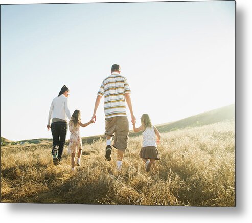4-5 Years Metal Print featuring the photograph Family Walking Together In Rural Field by Erik Isakson