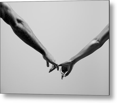 People Metal Print featuring the photograph Female And Male Connecting By Fingers by Jonathan Knowles