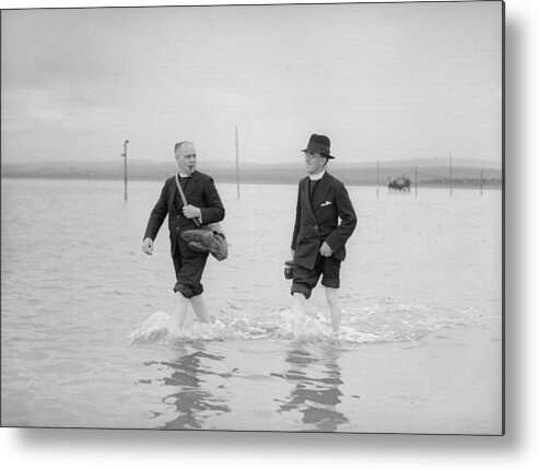 1930-1939 Metal Print featuring the photograph Holy Island Pilgrims by Fox Photos