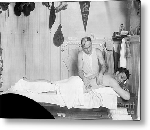 People Metal Print featuring the photograph Jack Dempsey Getting A Massage by Bettmann
