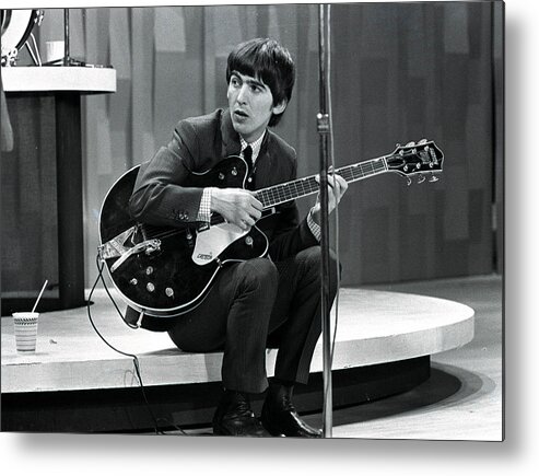 Holding Metal Print featuring the photograph The Beatles 1964 Us Tour. Guitarist by Popperfoto
