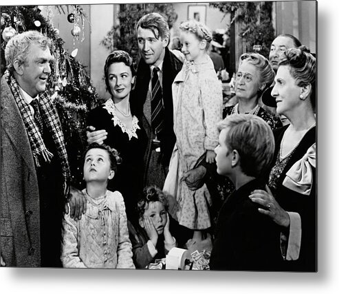 Beulah Bondi Metal Print featuring the photograph THOMAS MITCHELL , JAMES STEWART , DONNA REED and BEULAH BONDI in IT'S A WONDERFUL LIFE -1946-. by Album