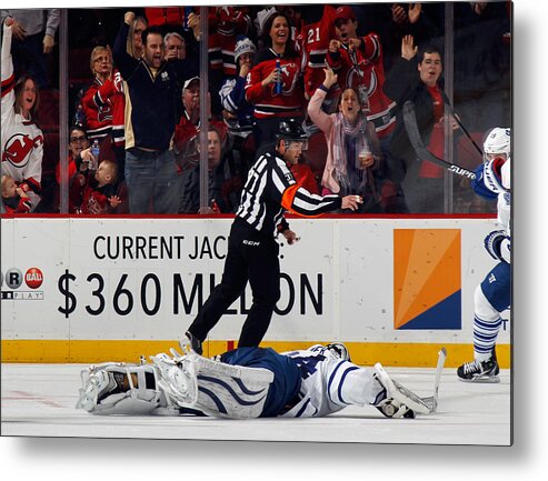 People Metal Print featuring the photograph Toronto Maple Leafs v New Jersey Devils #20 by Bruce Bennett