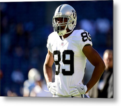 People Metal Print featuring the photograph Oakland Raiders v San Diego Chargers #3 by Harry How