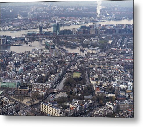 Tranquility Metal Print featuring the photograph Aerial of Amsterdam city center with rooftops and canals by Nisian Hughes
