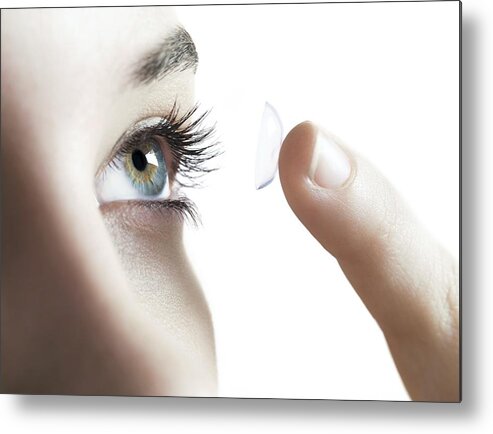 Full Frame Metal Print featuring the photograph Contact lens use by Science Photo Library