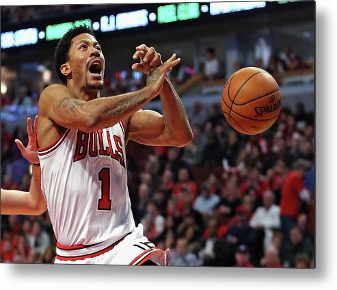 Chicago Bulls Metal Print featuring the photograph Derrick Rose and Michael Carter-williams by Jonathan Daniel
