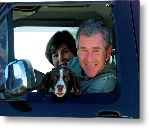 George W. Bush Metal Print featuring the photograph George Bush and Laura in Truck by Rick Wilking