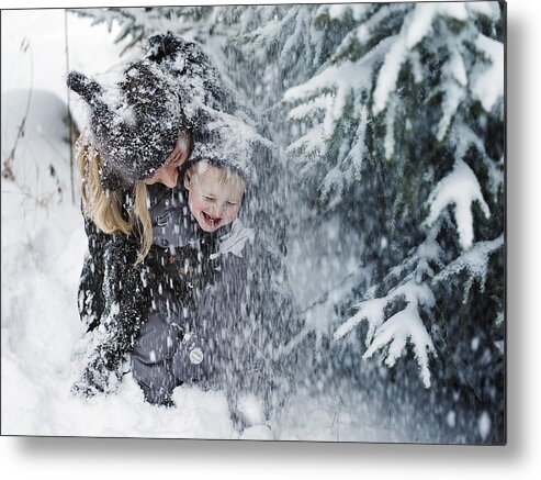 Copenhagen Metal Print featuring the photograph Mother and son in snowstorm by David Trood