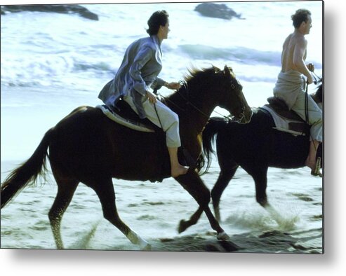 Actress Metal Print featuring the photograph Andie Macdowell And Paul Qualley Riding Horses by Arthur Elgort