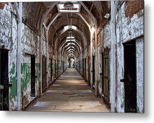 Eastern State Penitentiary Metal Print featuring the photograph Cell Block One by Michael Dorn