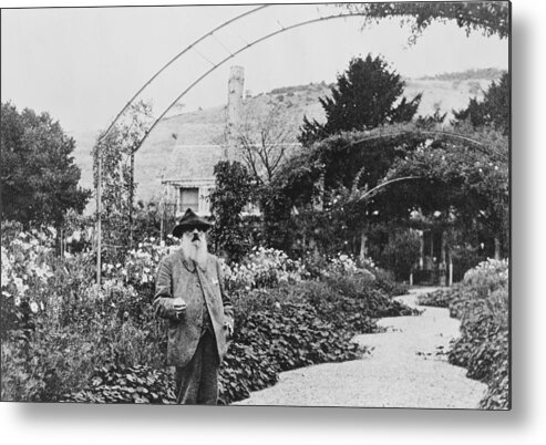 Claude Monet In His Garden At Giverny Metal Print featuring the photograph Claude Monet in his garden at Giverny by French School