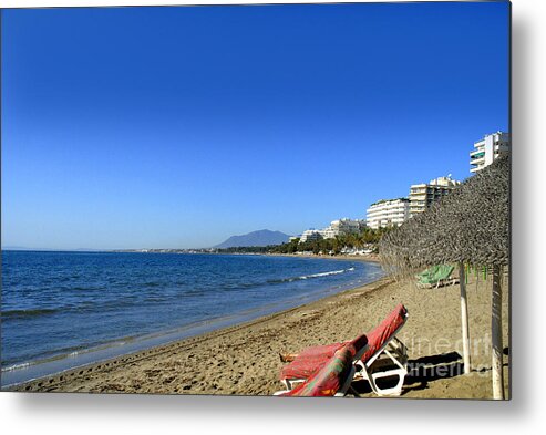 Sunset Metal Print featuring the photograph Empty beach at Marbella by Brenda Kean