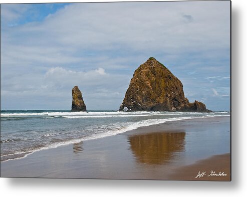 Beach Metal Print featuring the photograph Haystack Rock Reflected in the Wet Sand by Jeff Goulden