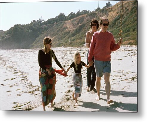 Malibu Metal Print featuring the photograph Joan Didion And John Gregory Dunne On A Beach by Henry Clarke