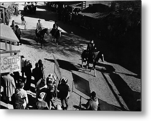 Johnny Cash Riding Horse Filming Promo Main Street Old Tucson Az A Gunfight Kirk Douglas A Boy Named Sue San Quentin Prison Concert Recorded By Granada Television Great Britain Metal Print featuring the photograph Johnny Cash riding horse filming promo main street Old Tucson Arizona 1971 by David Lee Guss