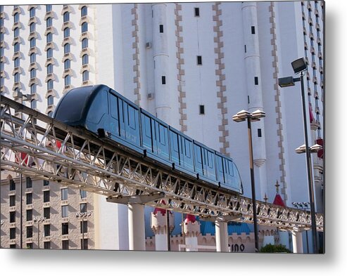 America Metal Print featuring the photograph Las Vegas Monorail And Excalibur Hotel by Mark Williamson/science Photo Library