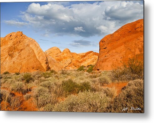 Arid Climate Metal Print featuring the photograph Rainbow Vista Lit by a Partial Solar Eclipse by Jeff Goulden