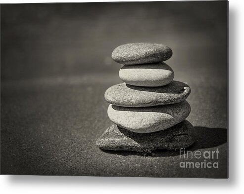 Rock Metal Print featuring the photograph Stacked pebbles on beach by Elena Elisseeva