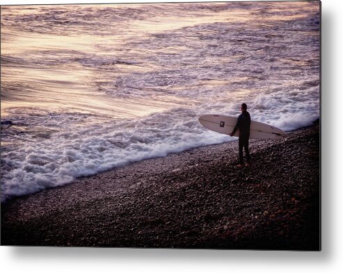 �2011 James David Phenicie Metal Print featuring the photograph Surfer and the ocean at sunset. by James David Phenicie
