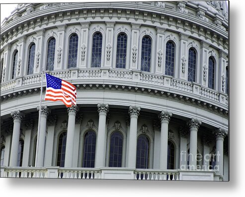 American Culture Metal Print featuring the photograph Waving US flag in front of the Capitol Building by Oscar Gutierrez