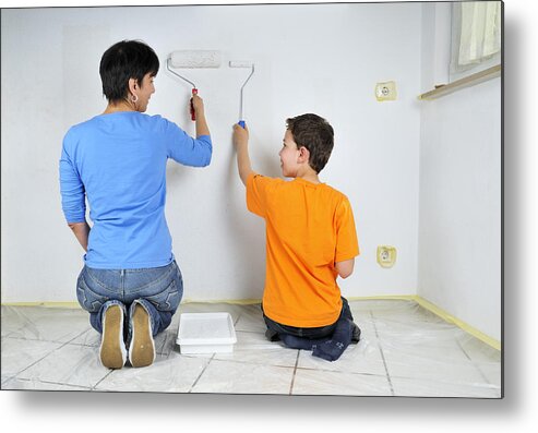 Teamwork Metal Print featuring the photograph Paintwork - mother and son painting wall together by Matthias Hauser