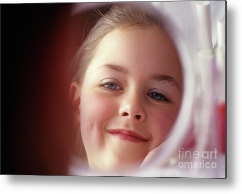 Child Metal Print featuring the photograph Young Girl Smiling in Mirror #1 by Jim Corwin