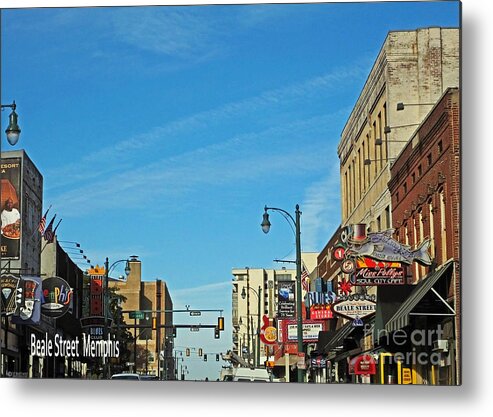 Beale Street Metal Print featuring the photograph In the Middle of Beale Street Memphis by Lizi Beard-Ward